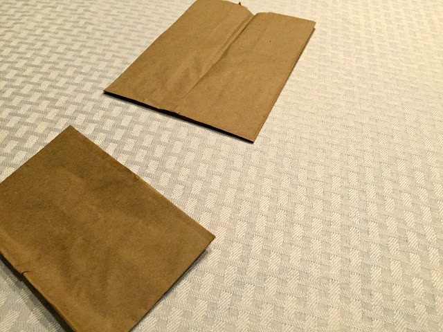 Cutting paper bags to make Fall Fun Treat Bags