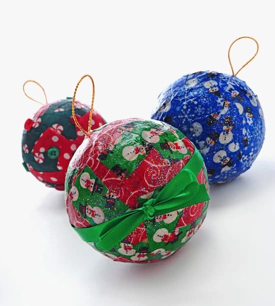 http://modpodgerocksblog.com/2009/11/fabric-ornaments-with-your-little-ones.html