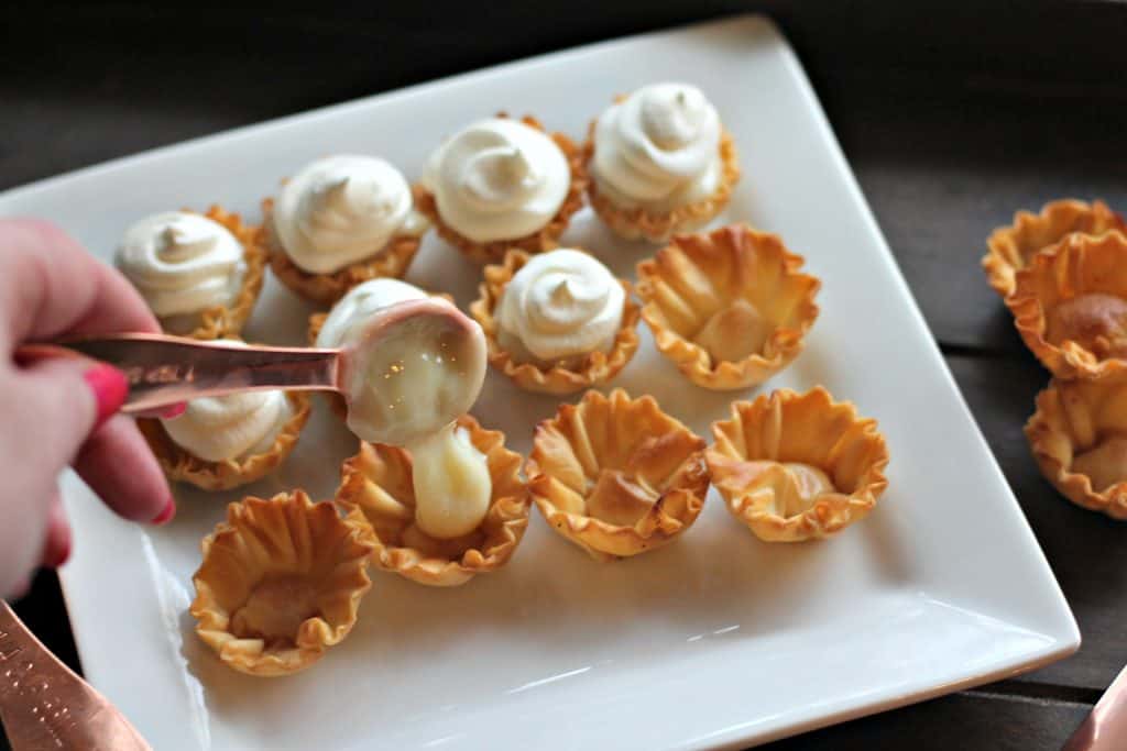 Mini Key Lime Tarts - Filling mini phyllo cups with key lime filling and Cool Whip