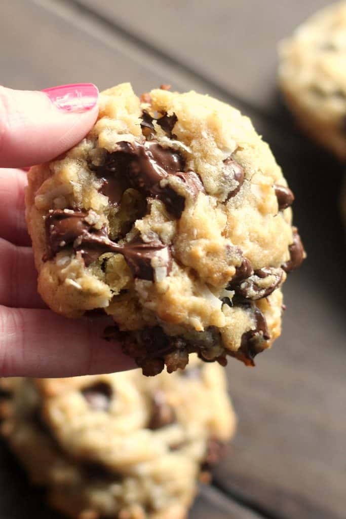 Coconut Oil Chocolate Chip Cookies are filled with rich chocolate chips and come out of the oven slightly crisp around the edges while staying perfectly moist and fluffy. Whip up a batch and eat them warm with a glass of ice cold milk. #CoconutOil #Chocolate #ChocolateChip #ChocolateChipCookies #Coconut #MomNeedsChocolate #Cookies