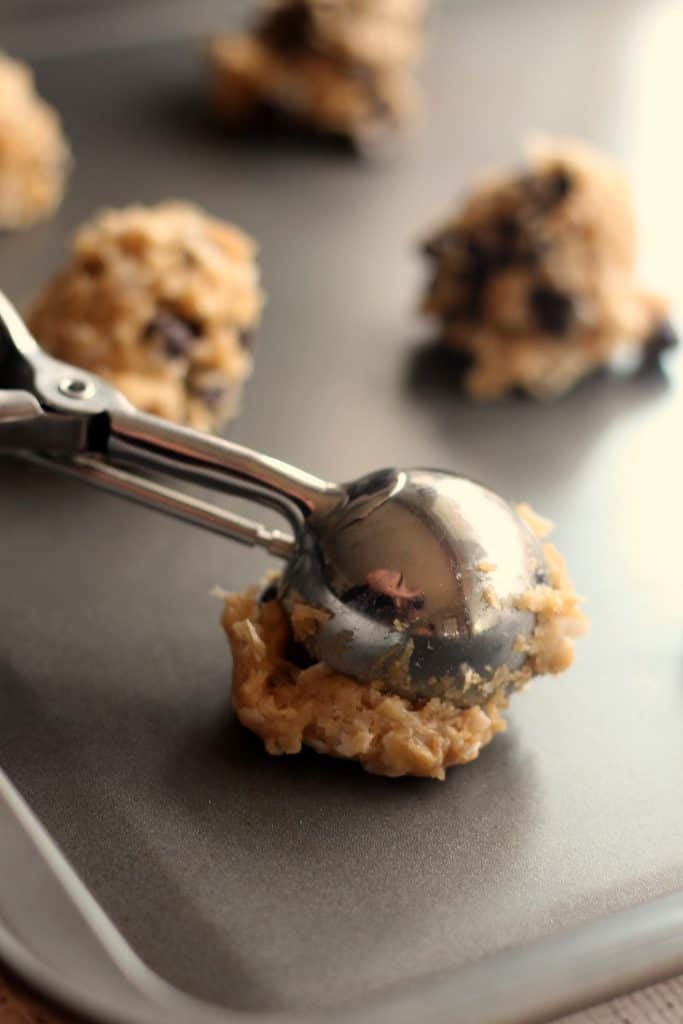 Using a Pampered Chef scoop to form perfect Coconut Oil Chocolate Chip Cookies