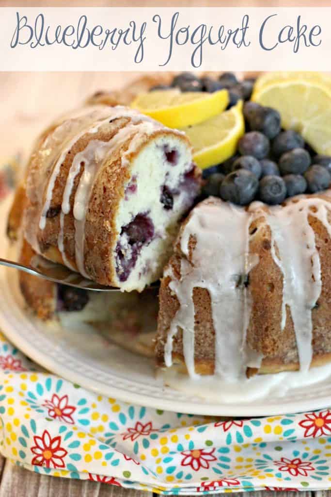 Blueberry Yogurt Cake is a wonderfully easy to prepare dessert full of fresh flavors. Pair this moist blueberry filled cake with a cup of coffee and cream to start your day, end a meal, or for a yummy afternoon treat. | #Cake #Blueberry #Blueberries #BlueberryYogurtCake #Yogurt #Dairy #Butter #Cream #Lemon #BlueberryLemonCake #BlueberryCake #Summer #Dessert #MomNeedsChocolate