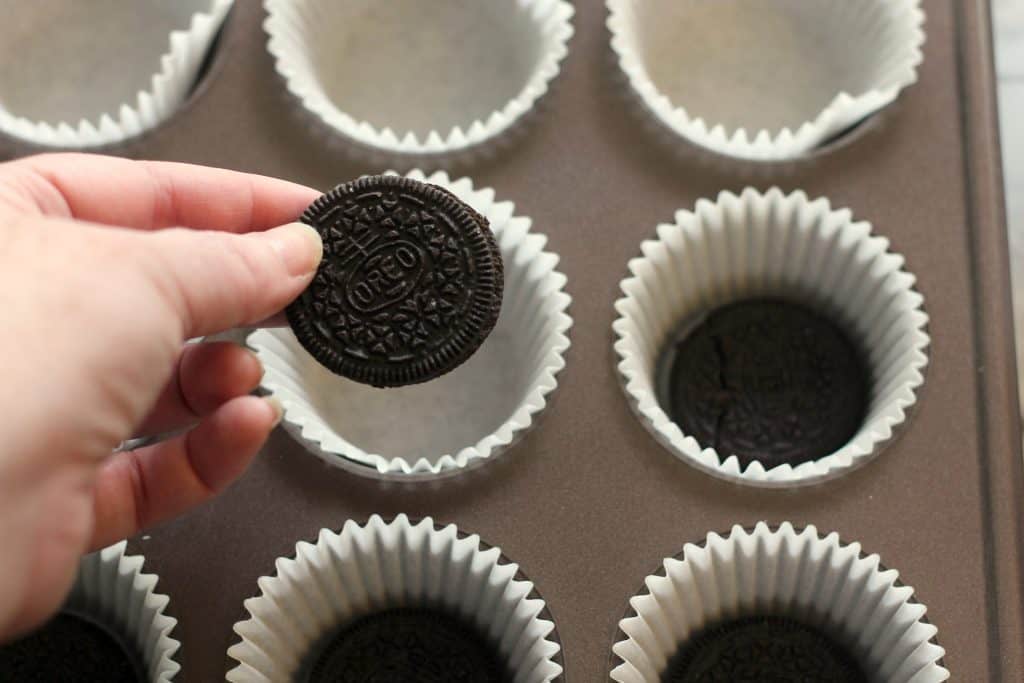 Prepping OREO's for No Bake Mini Peanut Butter Cheesecakes