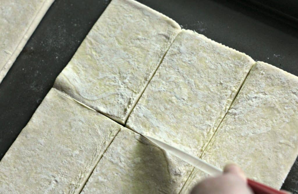 Cutting puff pastry for Apple Crumb Danishes