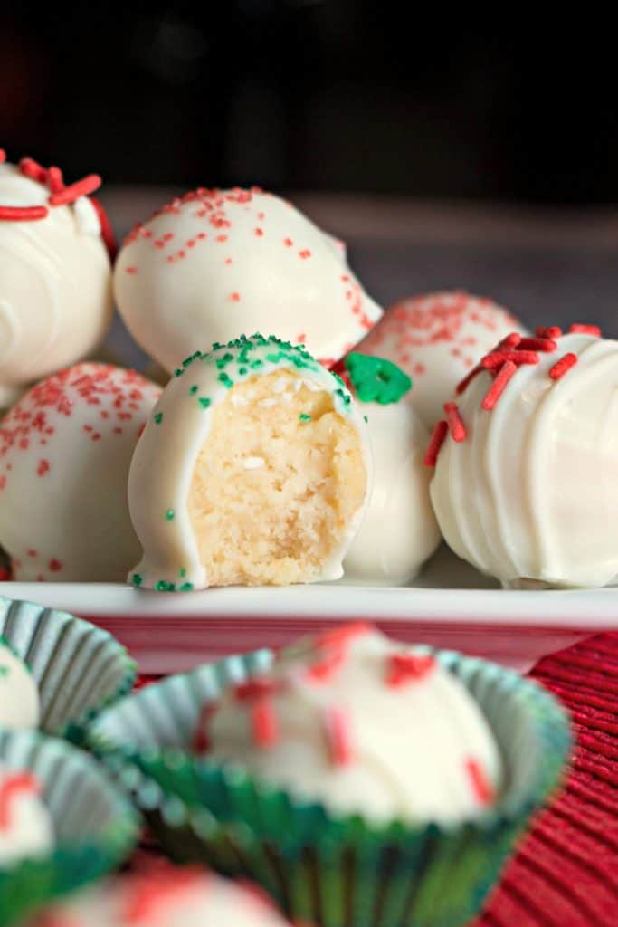 Christmas Sugar Cookie Truffles with a bite missing