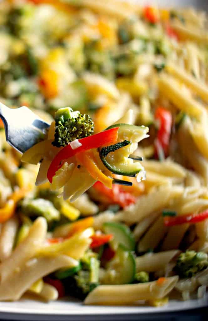 A delicious fork full of Penne Primavera with Butter Sage Sauce