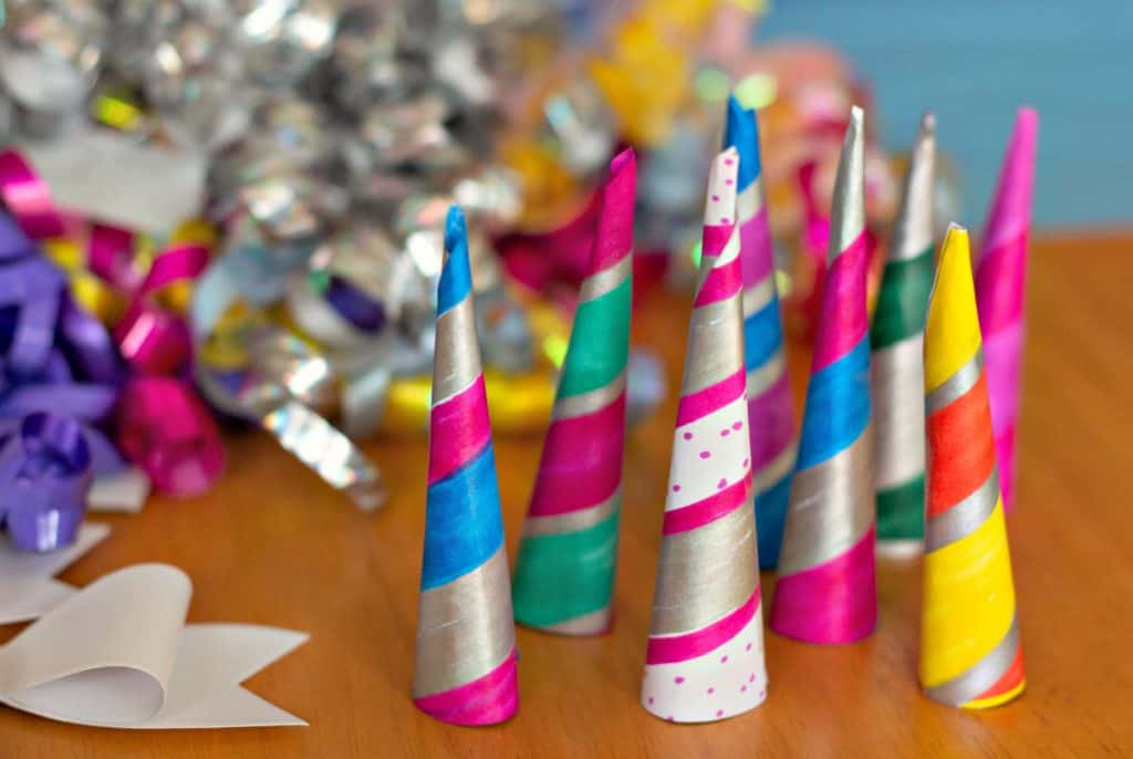 Colorful paper unicorn horns for making Unicorn Pudding Cups Craft