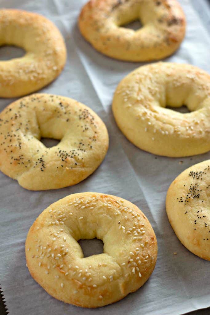 The Perfect Keto Bagels on white parchment paper