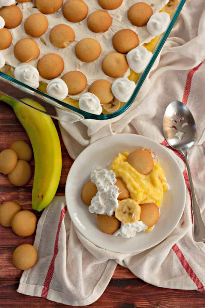 The Best Banana Pudding Recipe on a white plate with a spoon