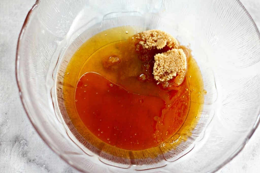 maple syrup, brown sugar, blue agave nectar, and vanilla extract in a clear mixing bowl