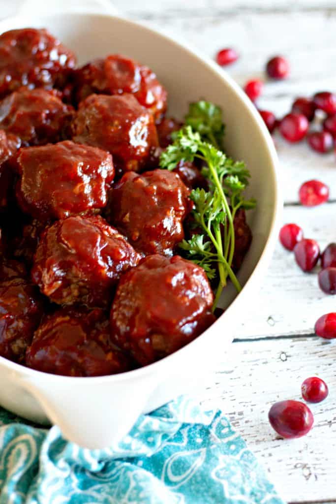 Homemade Cranberry Sauce Meatballs in a white baking dish