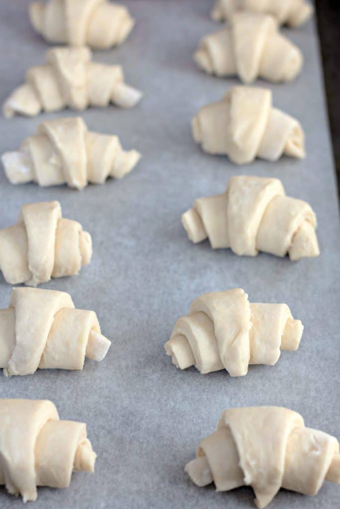 crescent roll dough on a cookie sheet