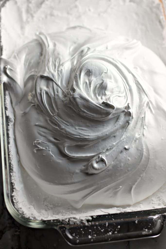 marshmallow cream in a powdered sugar lined dish