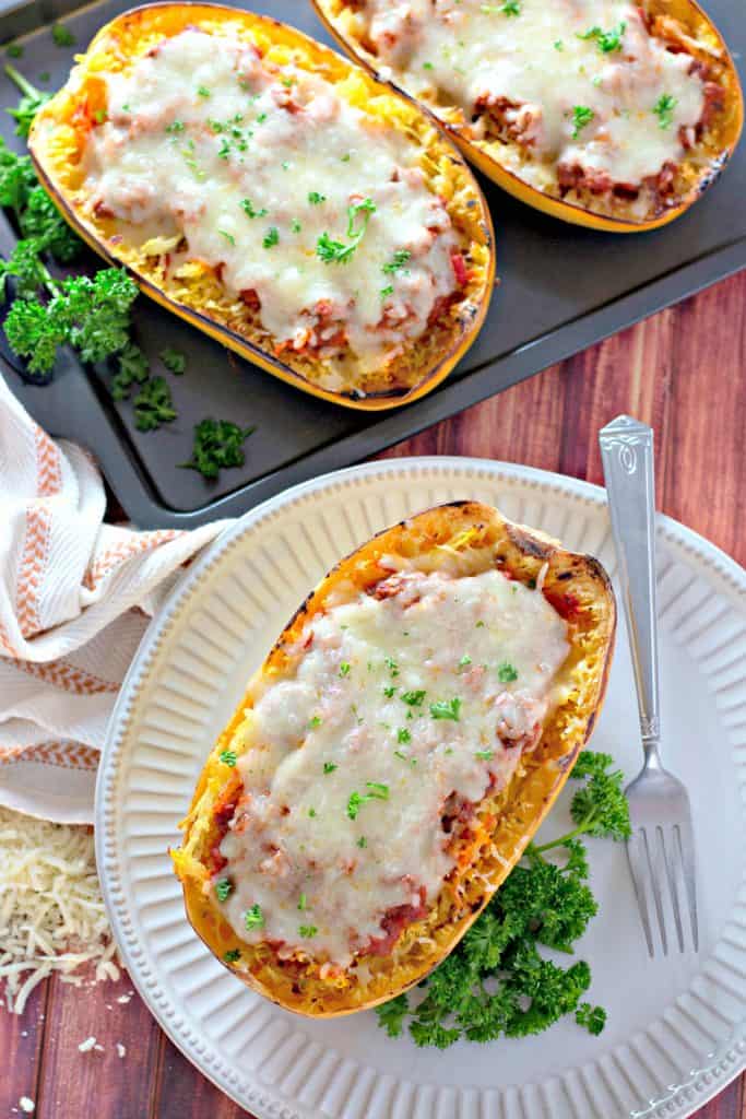Stuffed Spaghetti Squash on a white plate with a fork