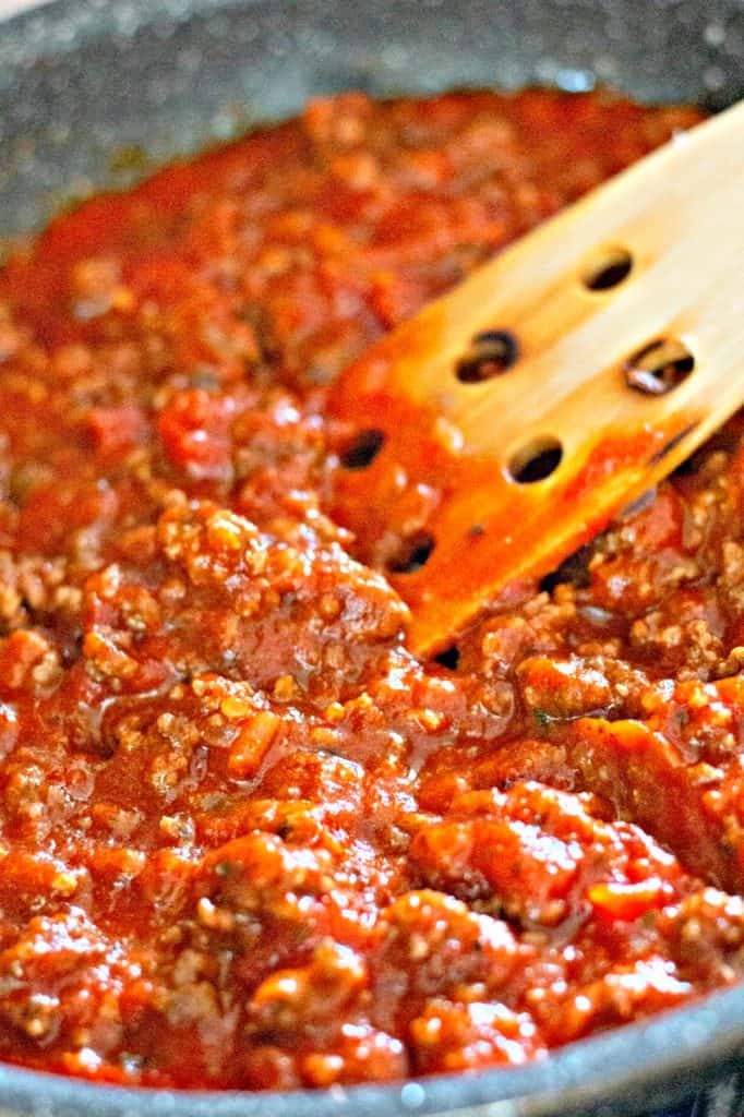 meat sauce simmering in a pan