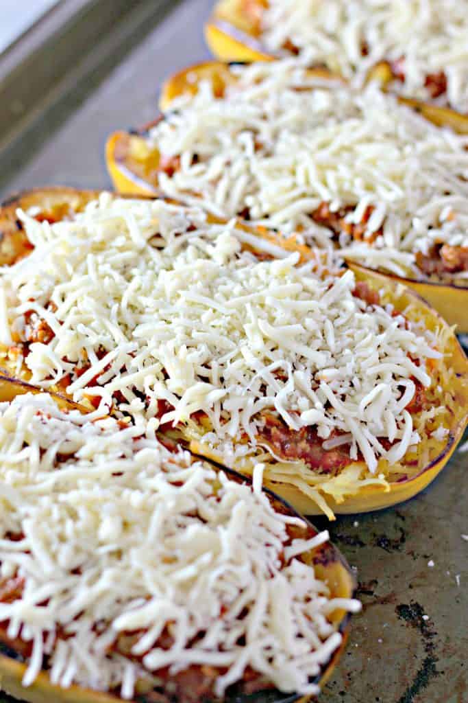 adding mozzarella cheese on top of the squash